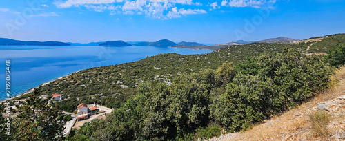 Wonderful photos of a stunning landscape in Croatia, featuring sweeping views, arid terrain, and endless expanses with water and buildings