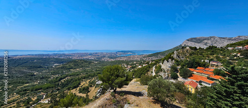 Wonderful photos of a stunning landscape in Croatia, featuring sweeping views, arid terrain, and endless expanses with water and buildings