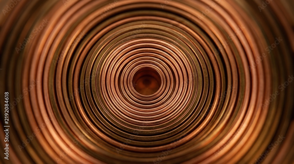 Fototapeta premium Concentric copper-brown rings forming a hypnotic circular macro pattern, abstract material photography, bronze, burnt umber and amber palette, glossy highlights, shallow depth of field, smooth curved