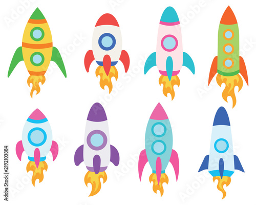 Collection of colorful cartoon space rockets blasting off isolated on white background.