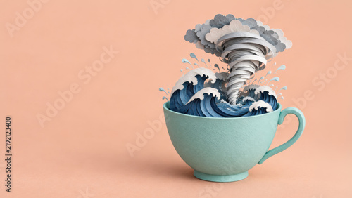 A paper-style tornado swirls above layered blue waves inside a turquoise teacup against peach, playfully illustrating the metaphor of a tempest in a teacup