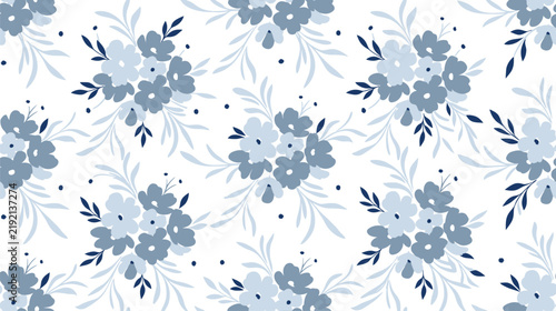 Blue floral seamless pattern with stylized petals and leaves on white background.