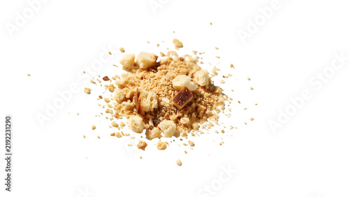 Crumbled biscuit topping with scattered pieces on transparent background crumb crumbs cookie fragments sprinkled texture grainy golden-brown beige