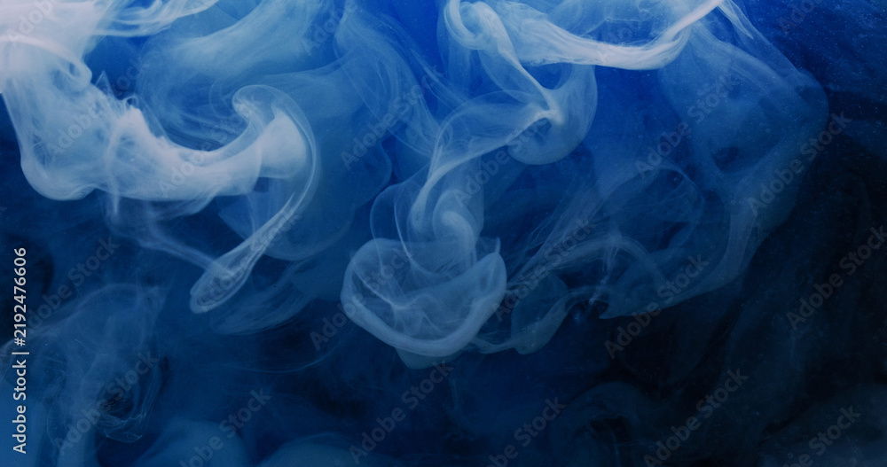 Fototapeta premium Color mist. Paint splash. Defocused blue underwater vapor liquid glitter water bright texture spreading on black abstract vibrant art background.