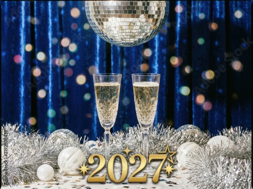 New year 2027 party with disco ball and champagne