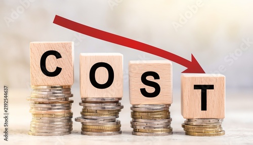 Cost Reduction Concept with Coins and Declining Arrow