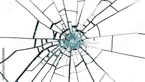Obraz na płótnie Shattered glass surface with sharp fragments radiating from impact point, isolat