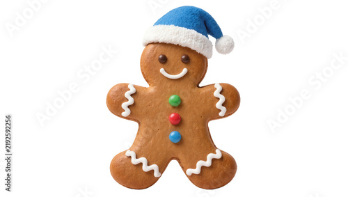 Gingerbread man cookie with blue Santa hat, isolated on transparent background