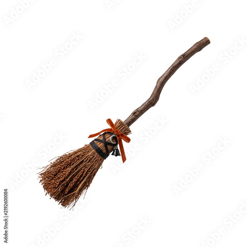 Rustic Witch Broom Isolated with Natural Twig Bristles, Curved Wooden Handle, Orange Ribbon, Crescent Charm and Small Bell for Halloween