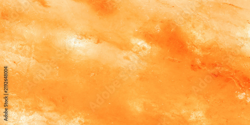 Himalayan salt slab texture, pastel colored textured surface yellow orange white gradient color. Natural pattern of organic salty background, close up banner organic marble pattern from salty block