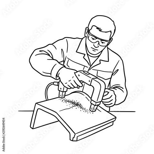 Industrial worker wearing safety glasses performs a magnetic particle inspection on a component, checking for surface cracks.