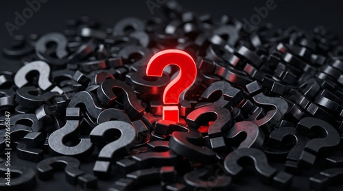 A glowing red 3D question mark symbol stands out amidst a pile of scattered black question marks on a dark background, representing concepts of decision making, problem solving, query, standing out.