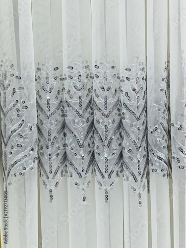 Fotografie Elegant White Sheer Curtain Featuring Intricate Silver Sequin Embroidery with Le