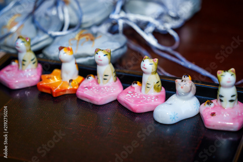 Ceramic incense holder in the shape of a kitten.