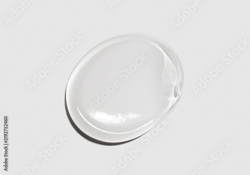 cosmetic smear cream gel texture on a light background