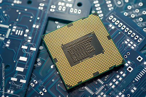 Naklejka Computer processor chip resting on circuit boards