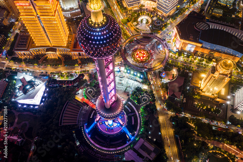 Photography Aerial night view of Oriental Pearl Tower with dazzling neon in Shanghai CBD