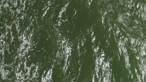 Sea waves seen from the ship's deck. From a ferry in the Baltic Sea at the end of summer