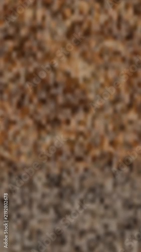 Brown and gray speckled stone texture. 2d animation