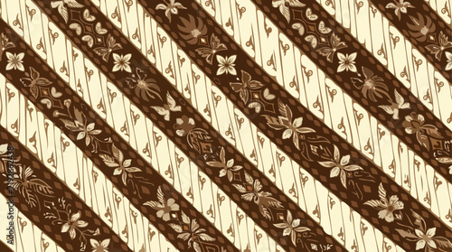 Traditional Indonesian batik fabric pattern with intricate floral and geometric brown motifs.