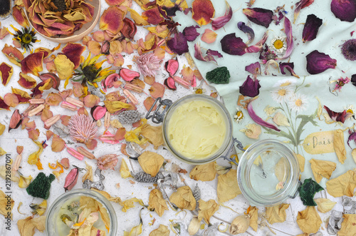 Принти на полотні A table strewn with dried flower petals