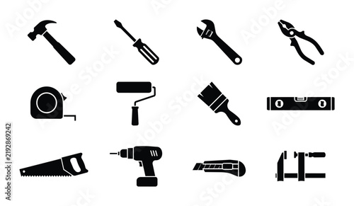 Set of 12 Black Silhouette Tools: Hammer, Screwdriver, Wrench, Pliers, Tape Measure, Paint Roller, Brush, Level, Saw, Drill, Cutter, Clamp. Construction and DIY Icons.