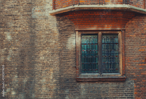 Textured Brick Wall Ornate Stained Glass Window