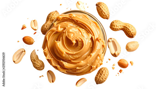 Smooth, creamy spread in glass bowl, surrounded by whole & split nuts on a black background