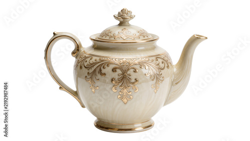Ornate cream ceramic teapot with gold filigree details, isolated on transparent background