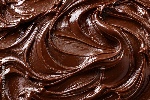 Rich creamy chocolate spread with smooth swirls and glossy texture