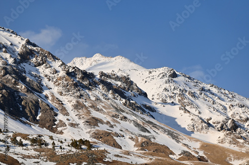 Mountain landscape with rocks and snow, Prielbrusye, Kabardino-Balkaria, Russia