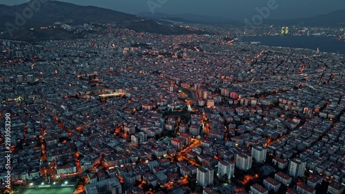 High Angle Aerial View of Dense City Buildings and Street Lights at Nightfall in Izmir Turkey