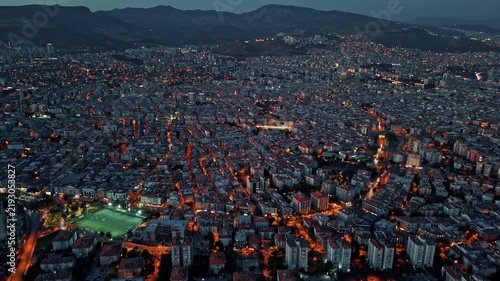 Panoramic Drone Shot of Sprawling City Lights and Izmir Bay Coastline at Dusk