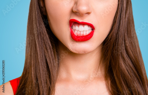 Принти на полотні Cropped close up view half faced view photo portrait of sexual seductive temptin