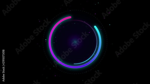 Bright neon blue, purple, and pink glowing rings rotate and spin in a circular motion against a dark abstract background with particles.