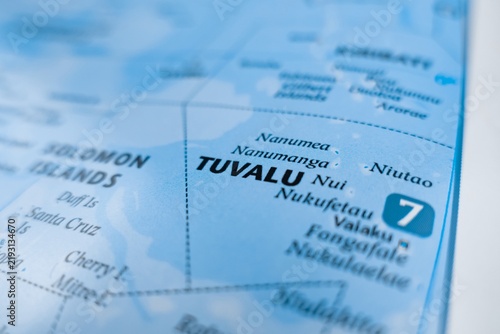 Map of Tuvalu styled in grey color. Selective focus on label, close-up view