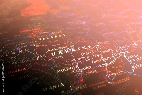 Map of Ukraine styled in cyber red colors. Selective focus on label, close-up view