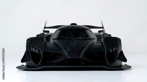 Front View of a Sleek Matte Black Prototype Race Car Isolated on White Background