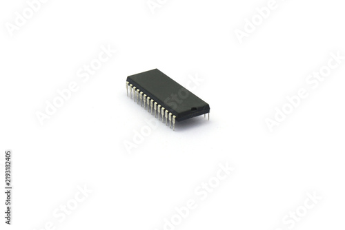 A blurry microcontroller on a white background. An archaic concept of technological advancement.