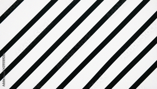 Minimalist black and white diagonal stripes background, geometric parallel line pattern, modern monochrome abstract texture for graphic design