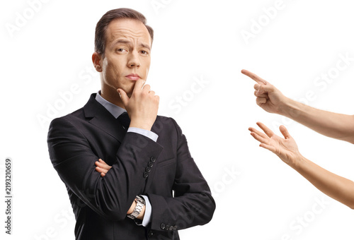 Foto Fingers reprimanding an arogant businessman