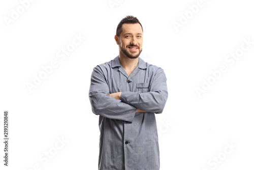 Bild auf Leinwand Man in pajamas and sleepers posing with crossed arms