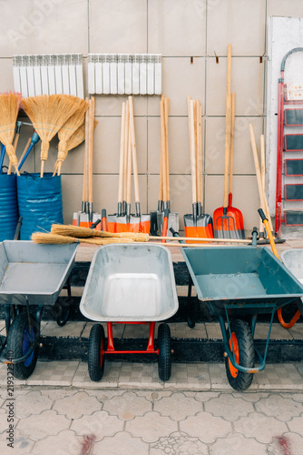Cuadro en lienzo Tools and equipment arranged on a wall in a workspace