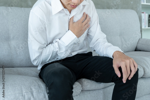 Cuadro en lienzo hand hold chest with heart attack symptoms, asian man have chest pain caused by