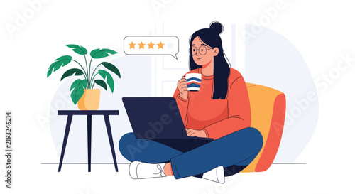 Customer sitting on bean bag drinking coffee and leaving five star positive review on laptop from home.