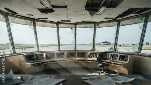 Modern Airport Air Traffic Control Tower with Large Windows and Electronic Equipment