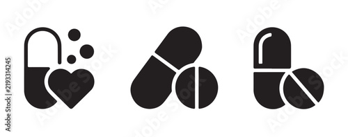 Black capsule pill and medicine tablet icons featuring minimal flat vector silhouettes for healthcare branding.