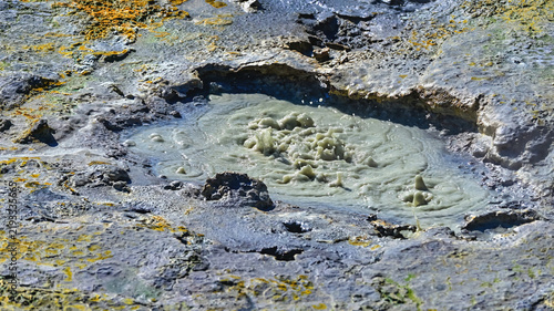 Cuadro en lienzo Close-up of a bubbling mud pot at Kerlingarfjoll, Iceland, with thick gray mud churning inside a mineral-crusted volcanic pool