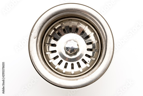 Картината върху платно A close-up view of a round metal sink drain with a circular design