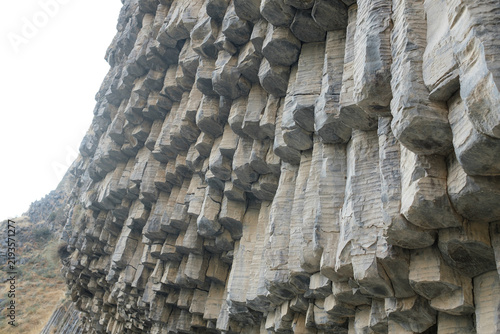 фотографія Basalt columns create a striking geological feature in Armenia, displaying intri